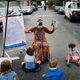A teacher and her students at an outdoor learning demonstration in Red Hook neighborhood in New York City.